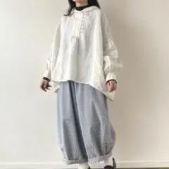 tumugu ソリトリネン フードブラウス