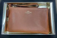 未使用】COACH リストレット ポーチ ブラウン 1941 SADDLE - メルカリ