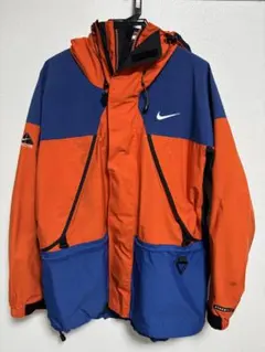 Nike ACG マウンテンパーカー オレンジ/ブルー