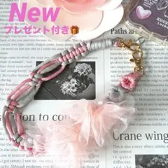 ❤️New❤️ パラコード　お花のスマホストラップ　フリルリボンピンク　プレゼント付