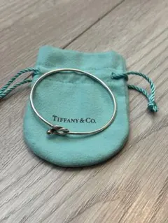美品 TIFFANY ティファニー SVxK18コンビ ラブノット バングル - メルカリ