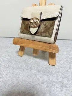 正規品Coach 二つ折り財布 アイボリー　シグネチャーホース&キャリッジ