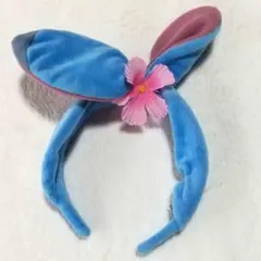 スティッチカチューシャ 花飾り付き - メルカリ
