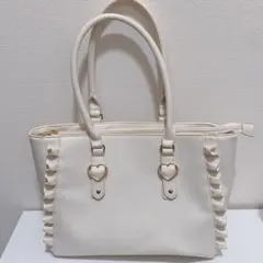 ザッカマート ハートバックルフェイクレザーフリルトートバッグ アイボリー A4