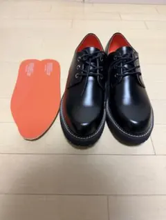 黒のレースアップシューズ
