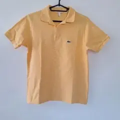 LACOSTE ポロシャツ オレンジ　ボーイズ 176cm（メンズS)のサムネイル