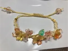 マクラメ編みブレスレット(オレンジ系)