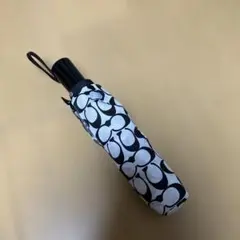 COACH コーチ折りたたみ傘 シグネチャー　ブラックホワイト