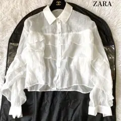 ZARA ショート丈セミシースルーフリルシャツ Lサイズ ホワイト ティアードのサムネイル