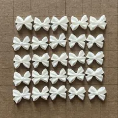 【まとめ割あり♡】ネイルパーツ　25個　リボン　アイボリー　蝶形