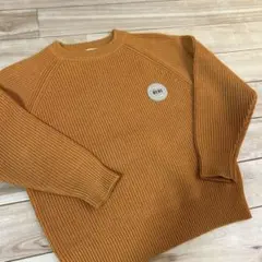 BEBE オレンジ リブ編み トレーナー