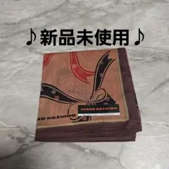 新品未使用　美品JUNKO KOSHINO 薄手ハンカチ リボン柄 ブラウンのサムネイル
