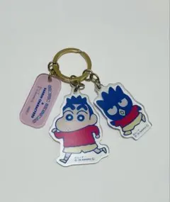クレヨンしんちゃん × サンリオキャラクターズのアクリルキーホルダーバッドばつ丸