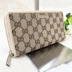 グッチ 長財布 ラウンドファスナー GG キャンバス ゴールド プレート 白