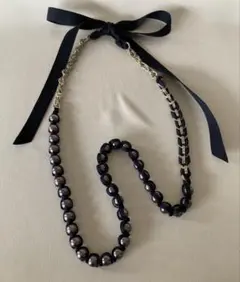 【美品】パールネックレス リボン ブラック トゥモローランドのサムネイル