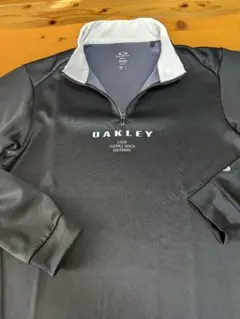 最終値下げ！ゴルフポロシャツOAKLEY ジップアップポロシャツ