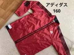 160 アディダス　ウィンドブレーカー　赤　裏起毛生地