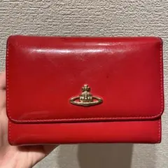 新品Vivienne Westwoodピーチ 蝶々留め 二つ折り財布 可愛い - メルカリ
