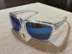 OAKLEY サングラス クリアフレーム ブルーレンズ - メルカリ