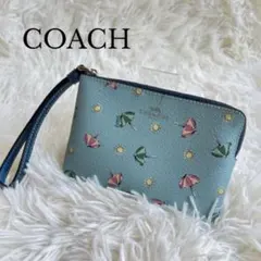 【美品】COACH コーチ リストレット ポーチ 傘 太陽 ブルー レザーのサムネイル