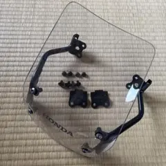 純正メーターバイザー　ステー付き　GROM JC92のサムネイル