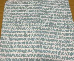 英字柄生地 水色 1m