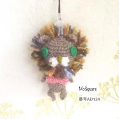 蝶ネクタイのまだら茶ライオンあみぐるみストラップorキーホルダーバッグチャーム