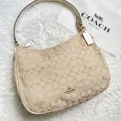 美品✨コーチ　ショルダーバッグ　シグネチャー　金具　キャンバス　レザー　ベージュ
