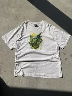 あ*い様 00s TRIBAL グラフィックプリント Tシャツのサムネイル