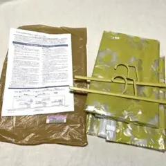 新品！未使用！フェリシモ　花畑　ハンガー付きつり下げ圧縮収納袋　イエローのサムネイル