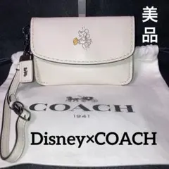 極美品ディズニー×コーチ　アクセサリーポーチ　クラブタンレザー　ホワイト　保存袋