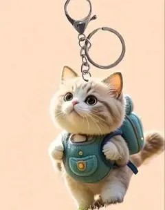 リュックを背負った猫のキーホルダー 可愛い 動物チャームsc260404185