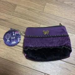 ANNA SUI 紫色の蝶モチーフポーチ