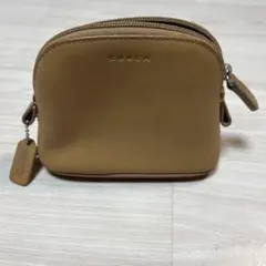 COACH ベージュ レザー ポーチ コーチ オールド - メルカリ
