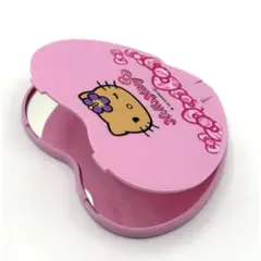 ハート型 ハローキティ 手鏡 ピンク(日焼けキティ)