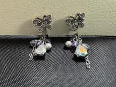 ANNA SUI 蝶デザインの紫色ストーンイヤリング