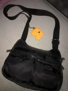 セール中】TUMI 折りたたみ ナイロン レザートートバッグ/エコバッグ 