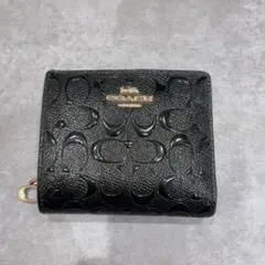 オープン価格】COACH シグネチャーエンボス加工 二つ折り財布 - メルカリ