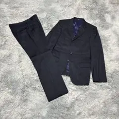 【美品】COMME CA ISM 120’s スーツ セットアップ 2釦 S紺紫のサムネイル