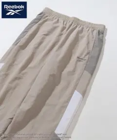 Reebok リーボックナイロントラックパンツ