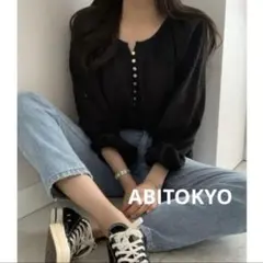 ABITOKYO フロントボタンデザインボリュームスリーブブラウスのサムネイル