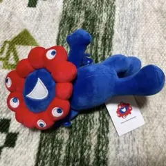 ミャクミャク　寝そべり　ぬいぐるみ