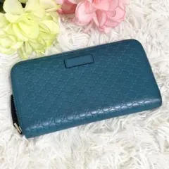 GUCCI マイクロシマ ラウンドファスナー ロゴプレート ターコイズブルー 青