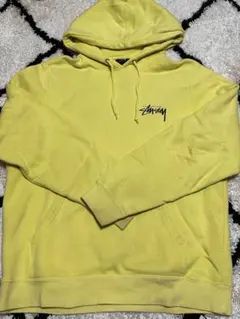 STUSSY スウェットパーカー イエローのサムネイル