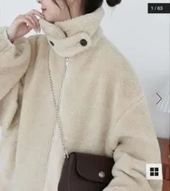 ディスコート Discoat カーリーファースタンドブルゾン アイボリー