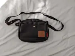 未使用 スヌーピー ミニショルダーバッグ 黒 スヌーピーチャーム付