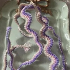 波状の紫とピンクの編みリボン約1メートル
