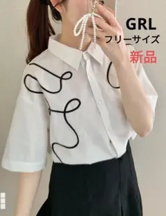 ウェーブ刺繍ブラウス