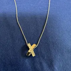 ニナリッチ　クロス型ストーン付きネックレス