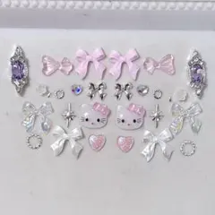 ネイルパーツ　サンリオ　キティ　ピンク　シルバーリボン　ハートビジュー　パール